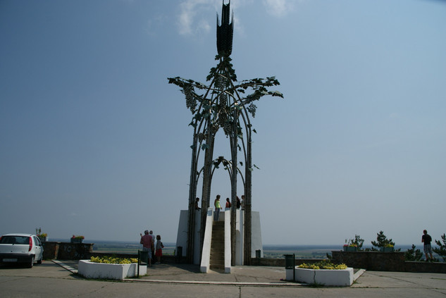 Sculpture near a road overlooking the land