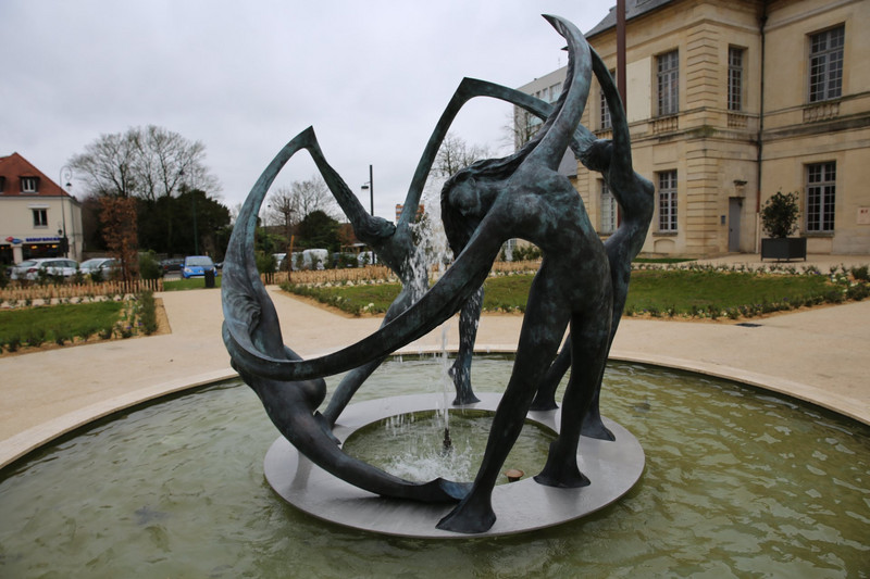 Sculpture on a fountain in the front yard of the Chateau Lambert
