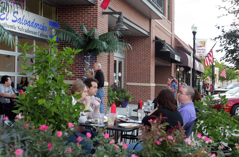 People dining at a outdoor restaurant in Downtown